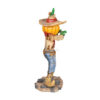 Pumpkin Scarecrow Playing Harmonica